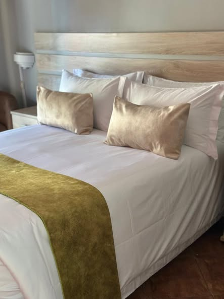 Detail of freshly made bed